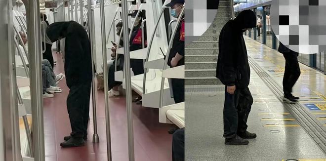 地铁现神秘黑衣男子